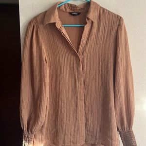 Express camel color, long sleeve button down blouse. Size medium.